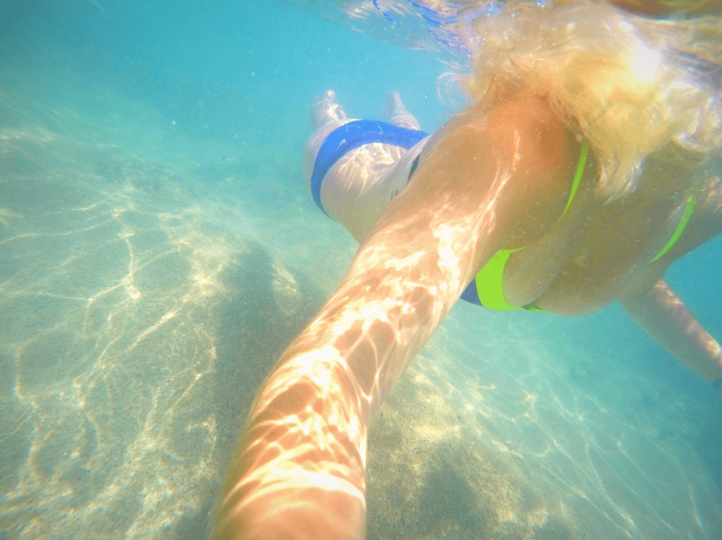 Swimming my booty off in Hawaii, because swimming is the best vacation workout. :) 